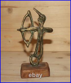 Antique hand made bronze archer figurine
