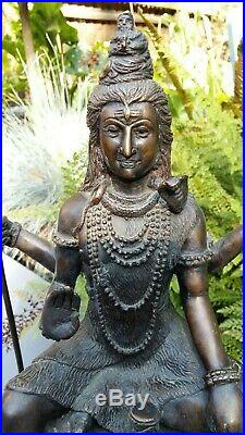 Asian bronze statue heavy well made item with staff in hand nice item