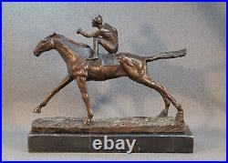 Bronze statue jockey with horse horse racing decorative figure sign. Remington