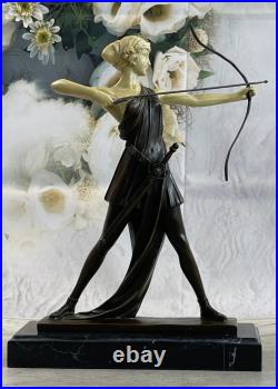 Diana with a bow statue made of bronze standing on a marble base Lost Wax