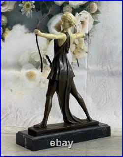 Diana with a bow statue made of bronze standing on a marble base Lost Wax