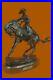 Frederic_Remington_Cowboy_Riding_Humps_Horse_Statue_With_Marble_Shop_01_zbh