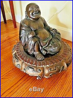 Japanese Bronze figure of a seated Hotai. Signed Chu/naka made