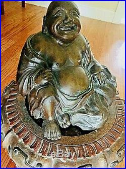 Japanese Bronze figure of a seated Hotai. Signed Chu/naka made