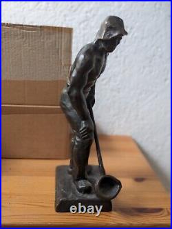Statue figure bronze 30 cm high. Picture of a steelworker